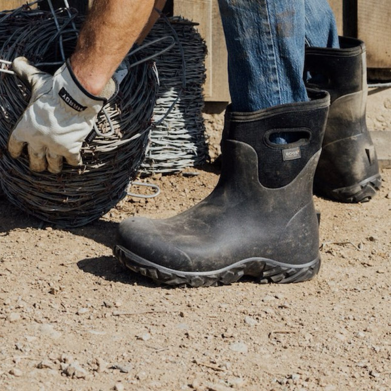 Shop the Men's Workman Tall Soft Toe waterproof farm & work boots. The featured product is the Men's Workman Tall Soft Toe in black.