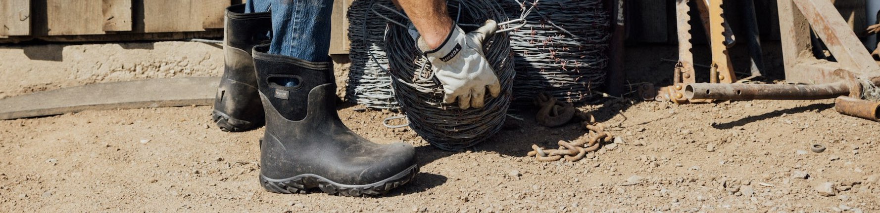 Shop the men's Workman Mid featuring the style on dirt with barbed wire.