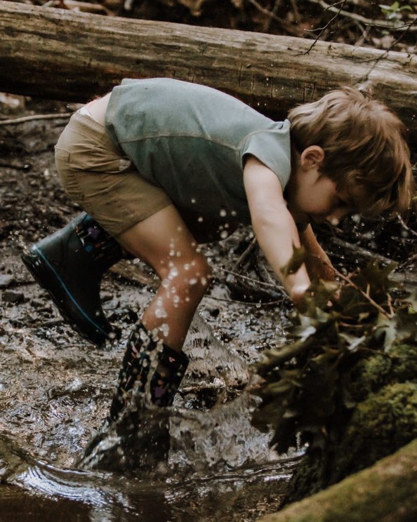 Click to shop kids favorite styles featuring a boy playing in a puddle.