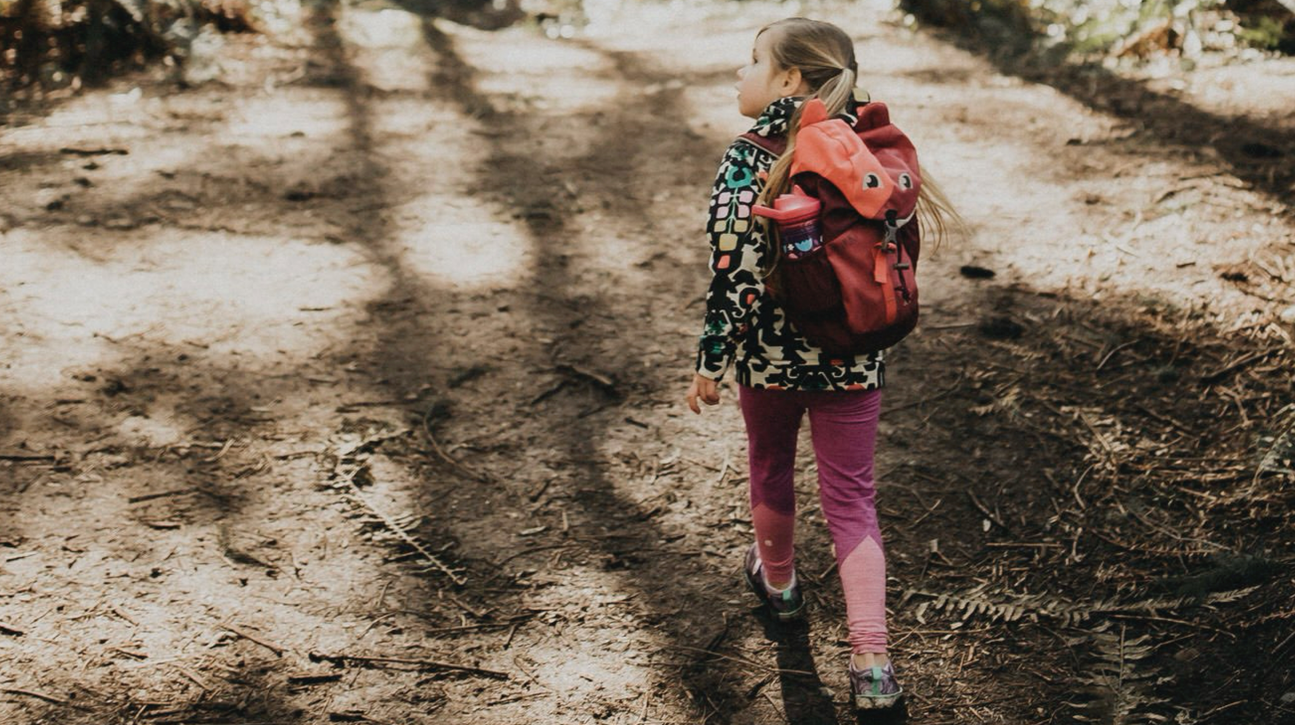 Shop Kids' back to school essentials featuring a girl with a backpack.