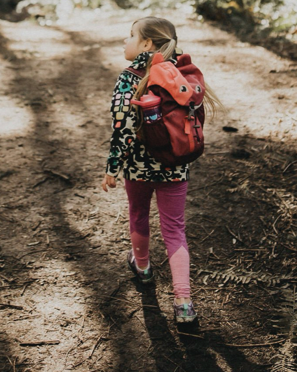 Shop Kids' back to school essentials featuring a girl with a backpack.