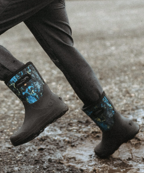 A waist down shot of a kid running through a muddy puddle in our new Kids' York Seamless. Shop our new arrivals.
