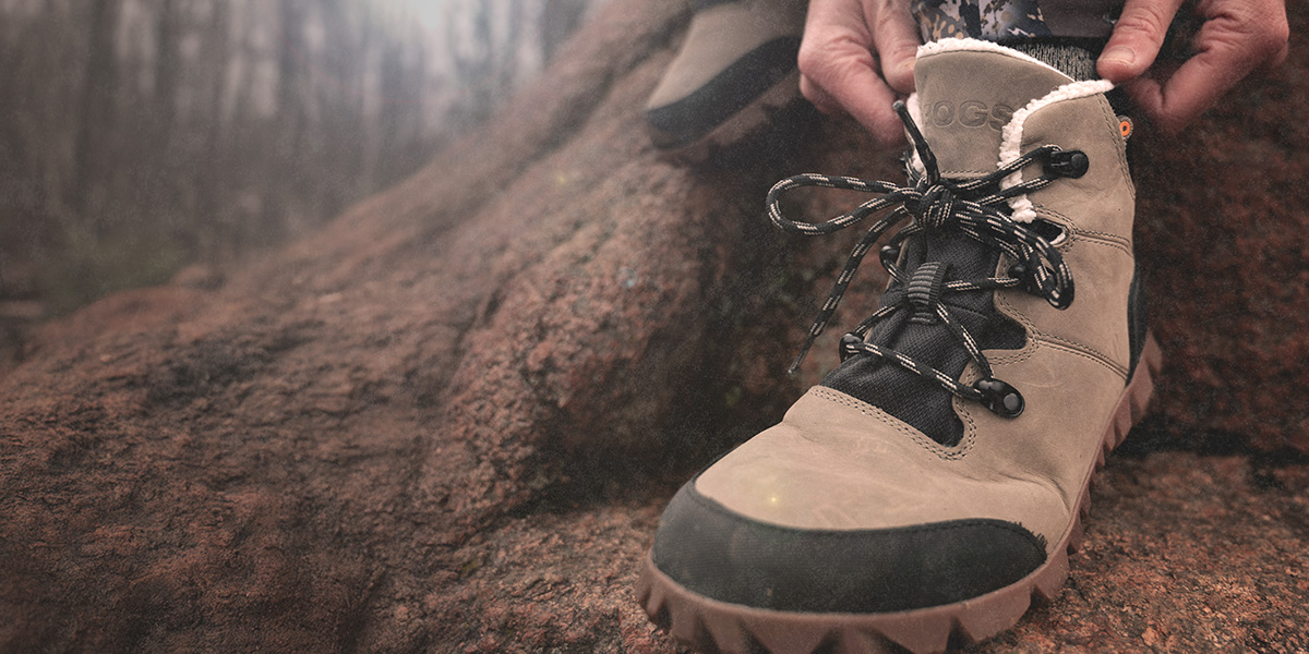 Shop the women's Arcata collection featuring a group of people on a snow bank.