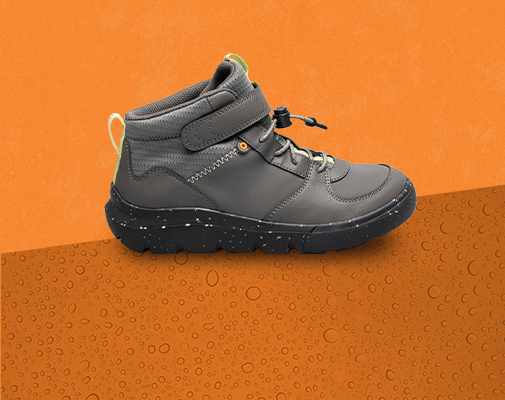 Shop the kids' skyline collection featuring the kicker WP on an orange background.