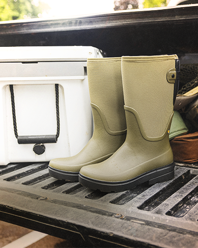 Shop the new Women's Hazel featuring the boots on a tailgate with a cooler. 