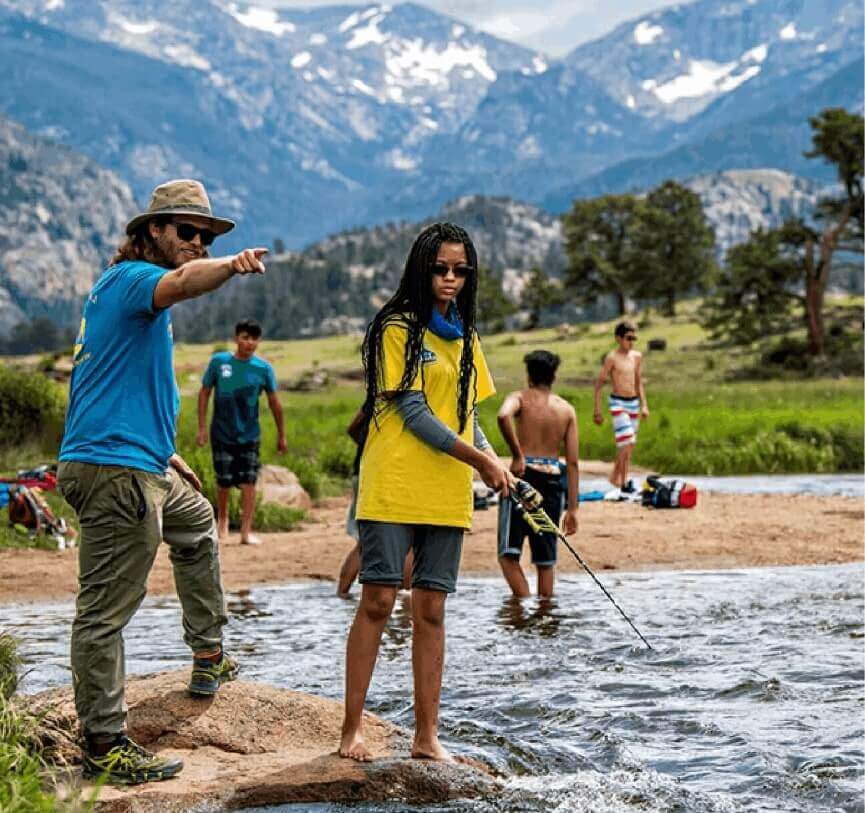 Our Featured Partners. Click here to learn more about kids outdoor education programs that provides experiences where youth learn by doing. The picture shown a bunch of kids circled around an adult who is showing them a bird.