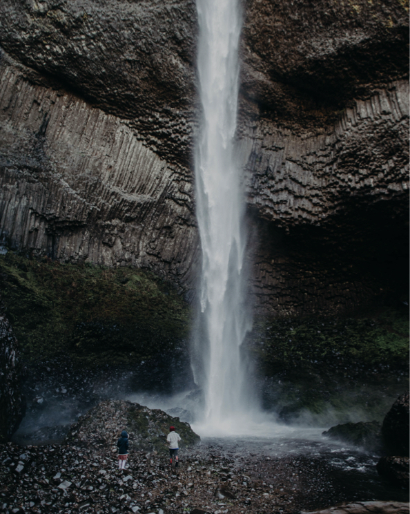 Shop our Canada Day Sale featuring 2 people under a waterfall.