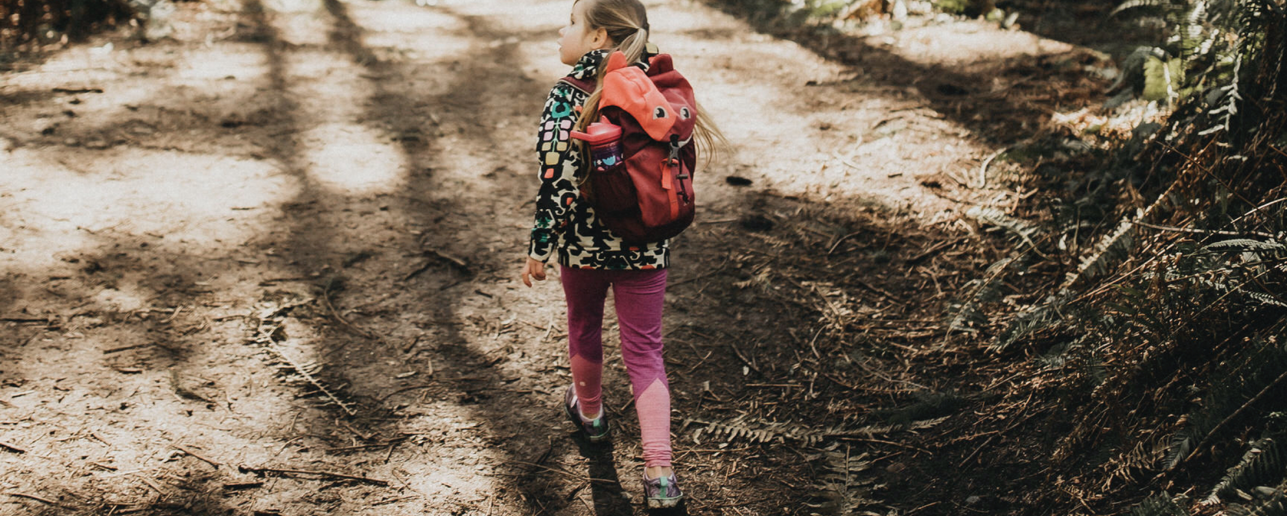 Shop Kids' back to school essentials featuring a girl with a backpack.