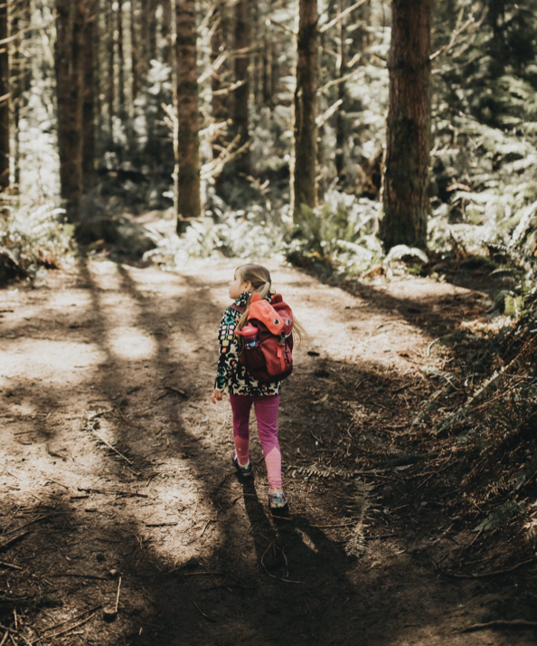 Shop Kids' back to school essentials featuring a girl with a backpack.