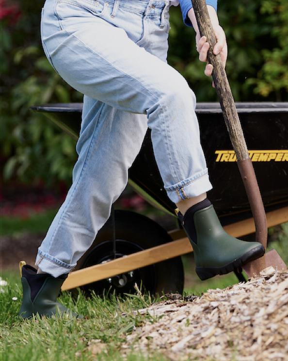 Shop our women's Sauvie Chelsea featuring a woman doing yard work. 