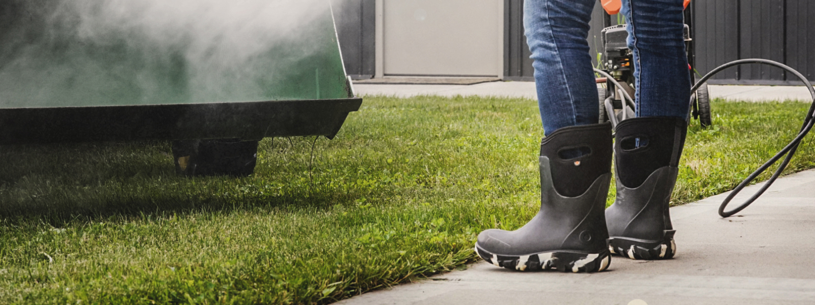 Shop Our Labour Day Sale featuring a women in her classic seamless spraying a tractor down